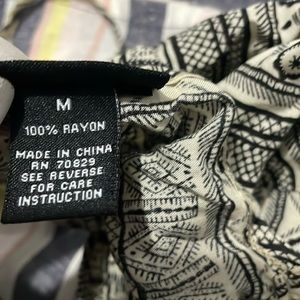 Medium cream and black womens jump suit